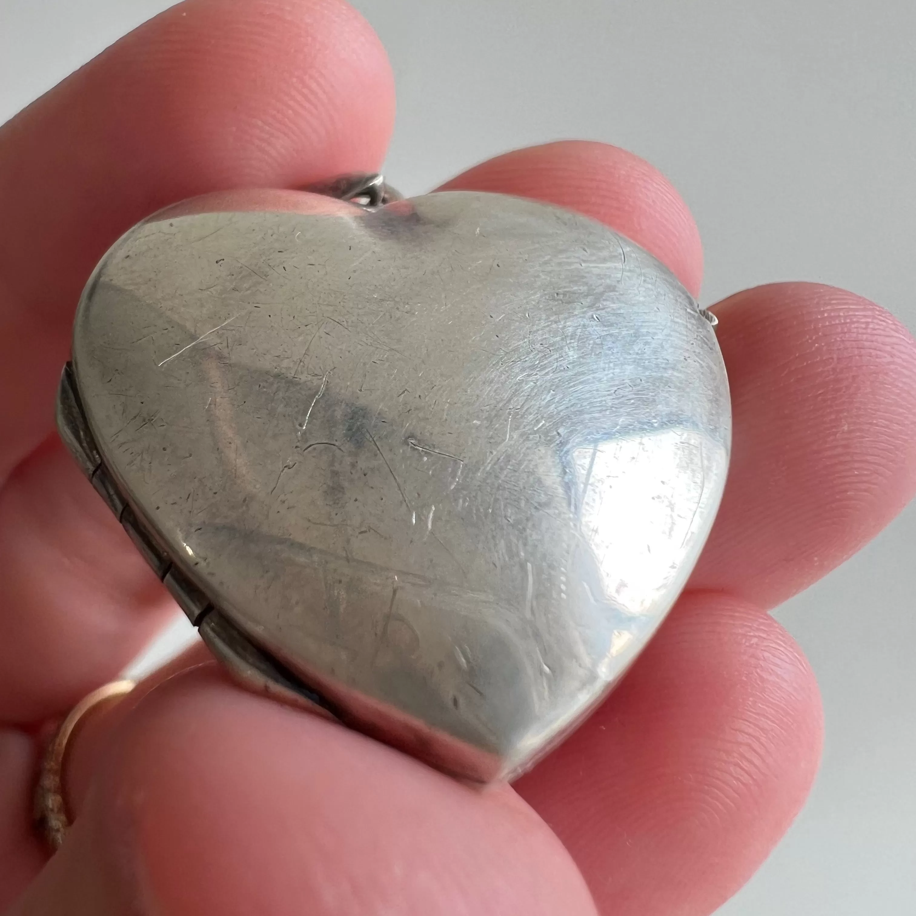 P R E - L O V E D  // no heart is simple / sterling silver slightly puffy heart locket / a pendant