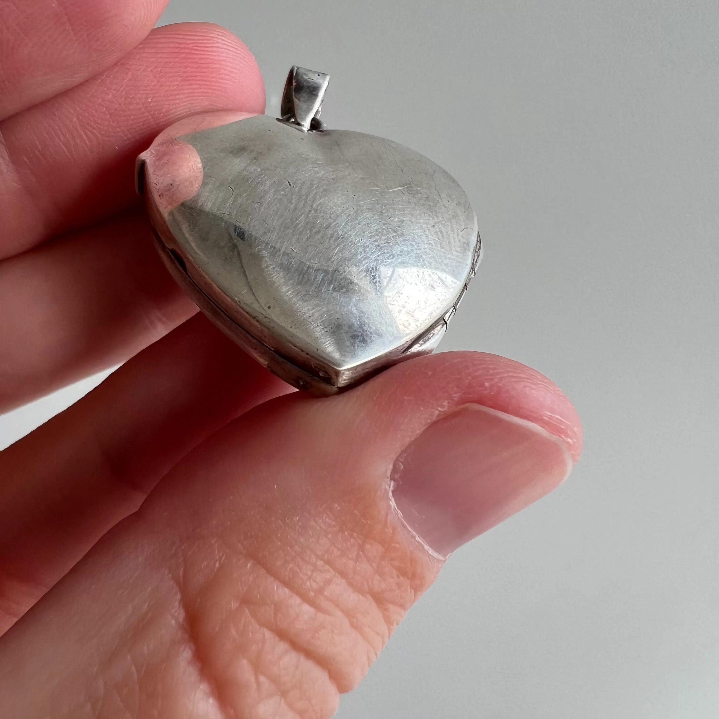 P R E - L O V E D  // no heart is simple / sterling silver slightly puffy heart locket / a pendant