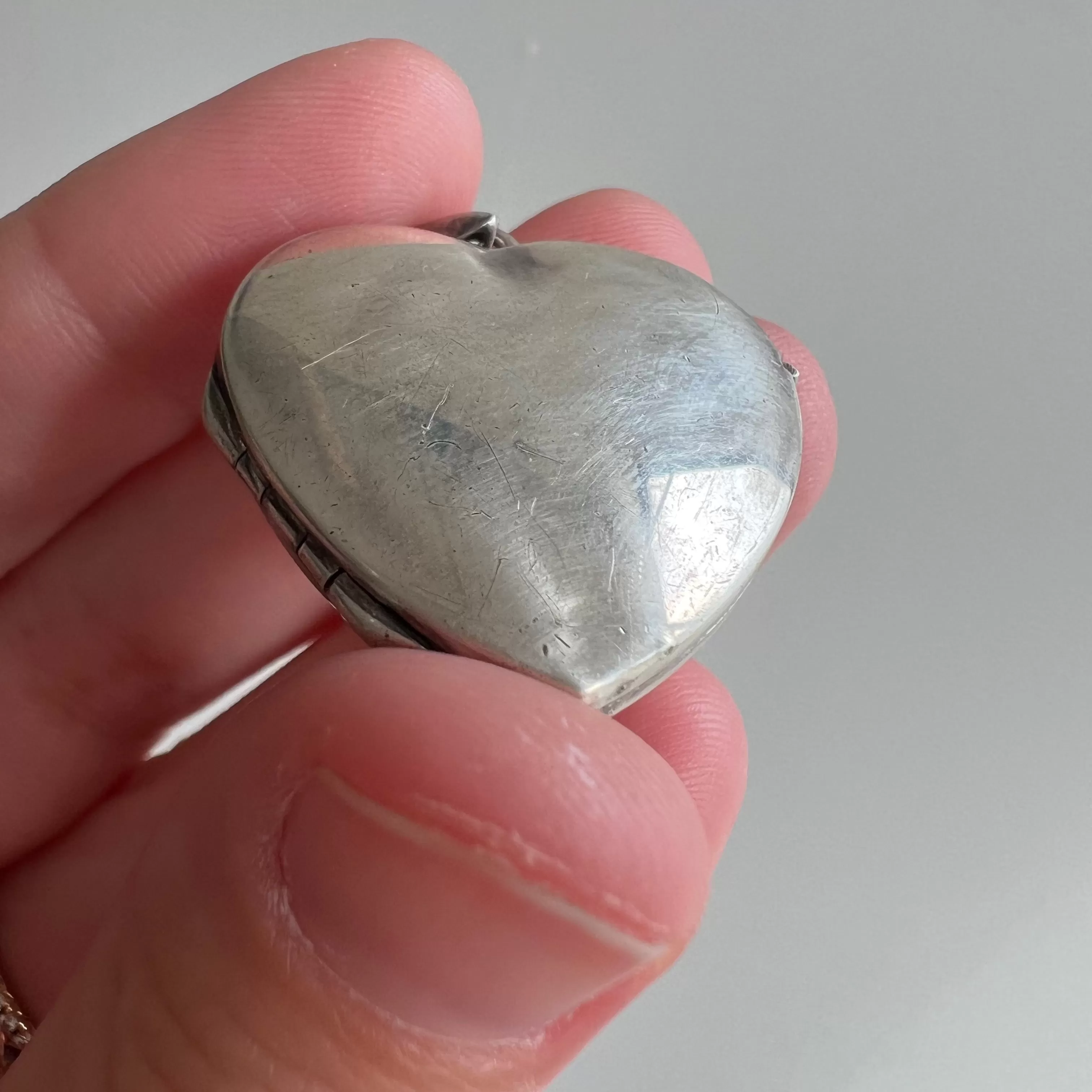 P R E - L O V E D  // no heart is simple / sterling silver slightly puffy heart locket / a pendant