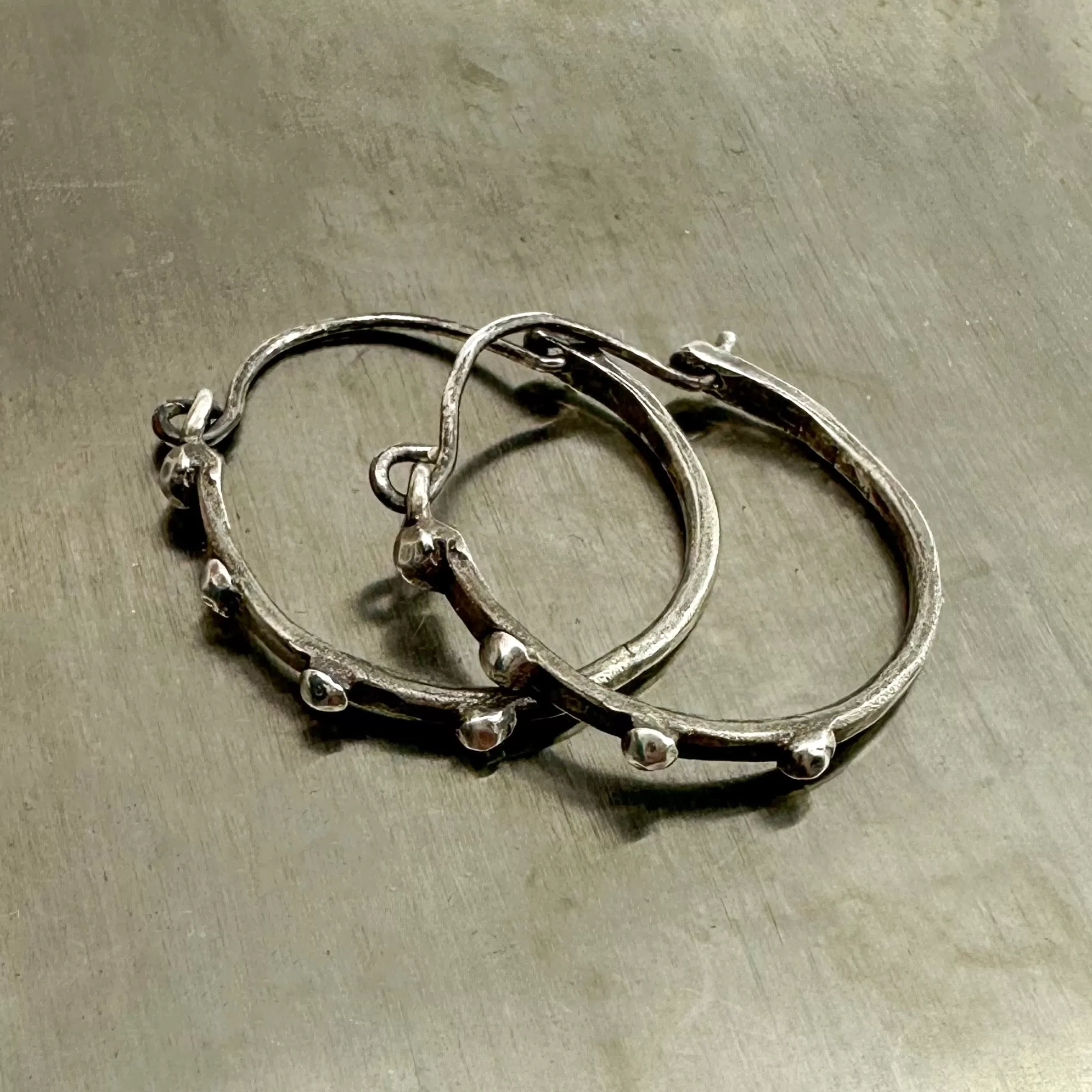 RIVETED Midi Hoops in Silver