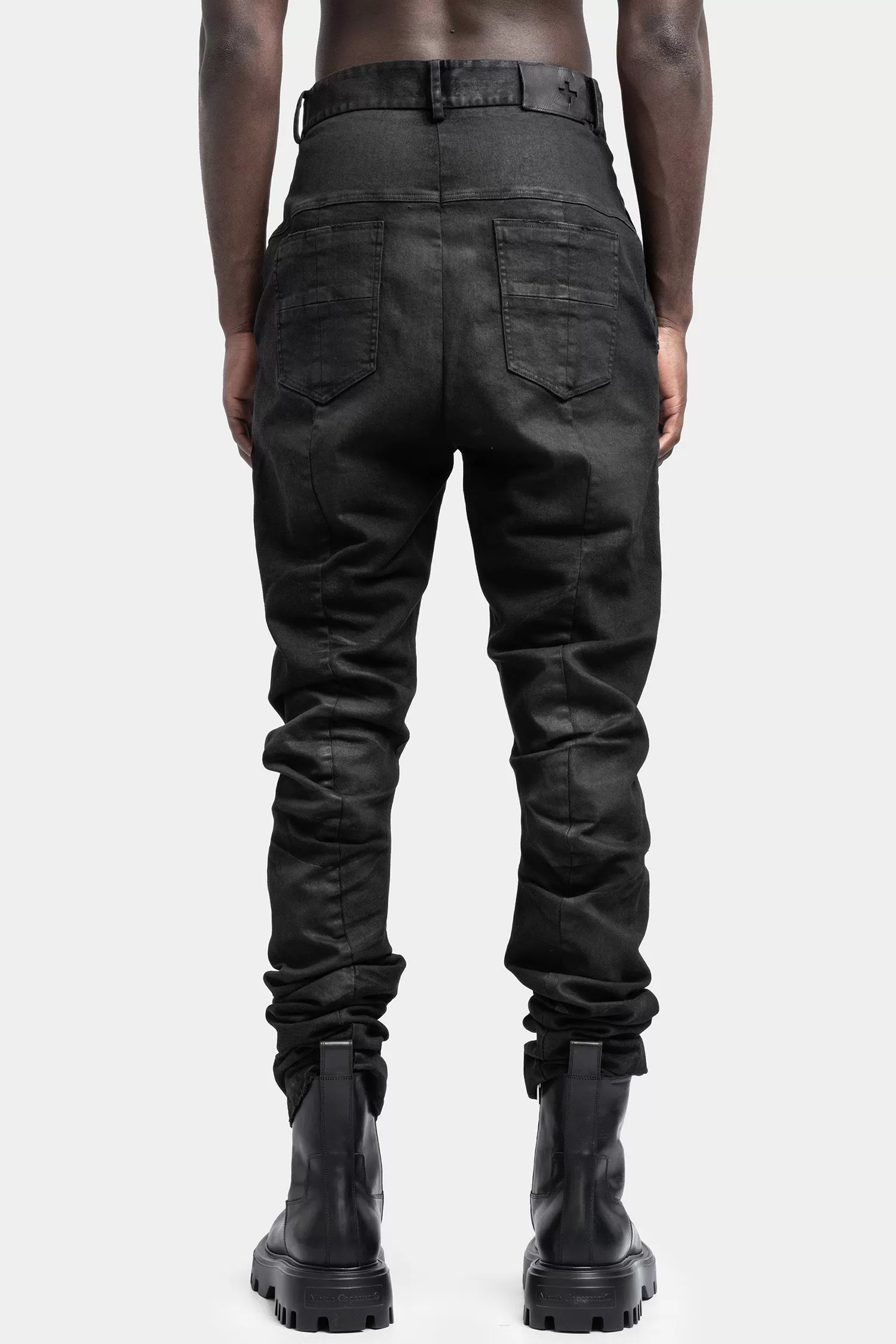 Waxed anatomical jeans